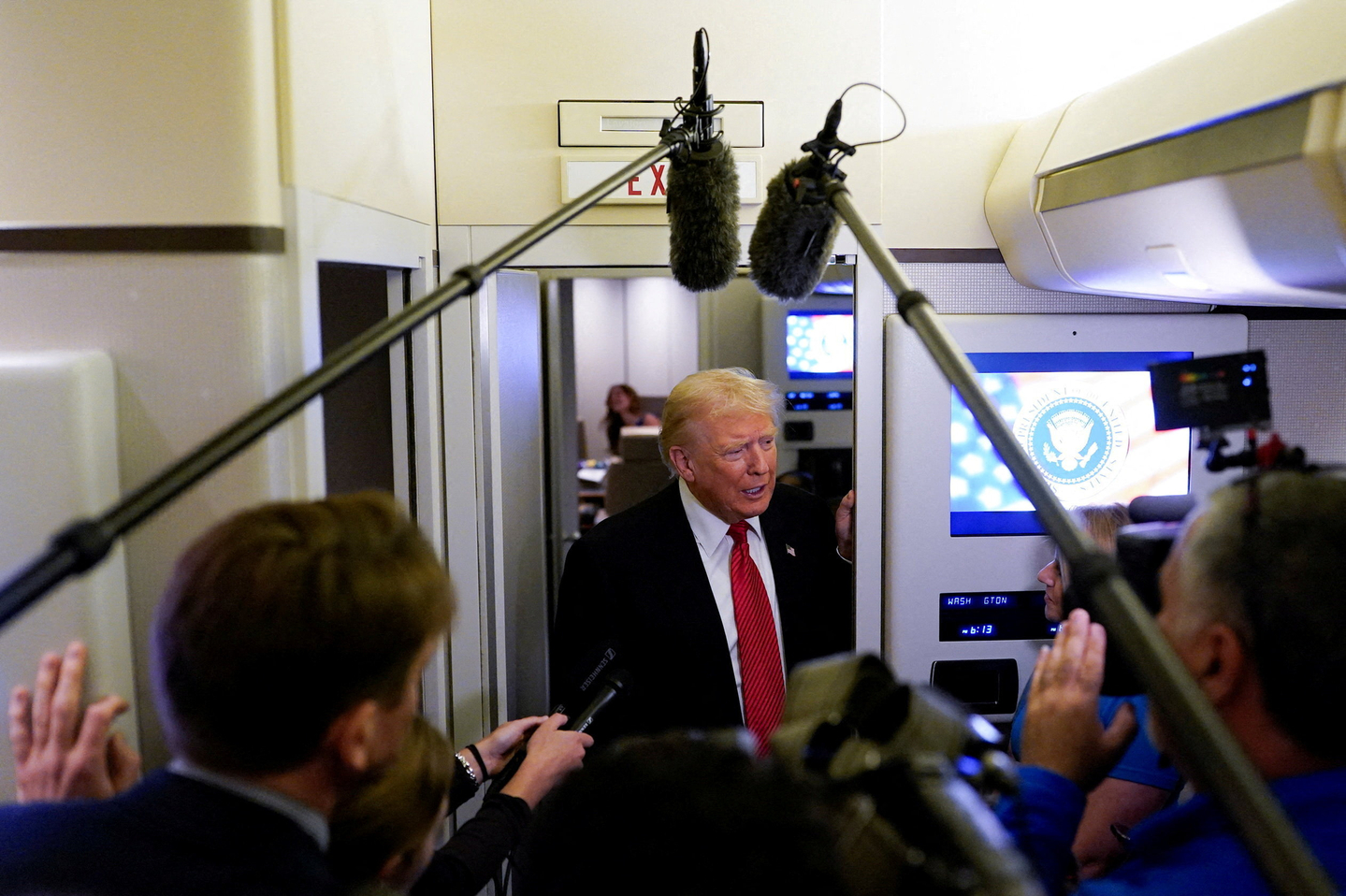 U.S. President Donald Trump speaks to members of the media on board Air Force One en route to Joint Base Andrews, U.S., November 2, 2025. [REUTERS/YONHAP]
