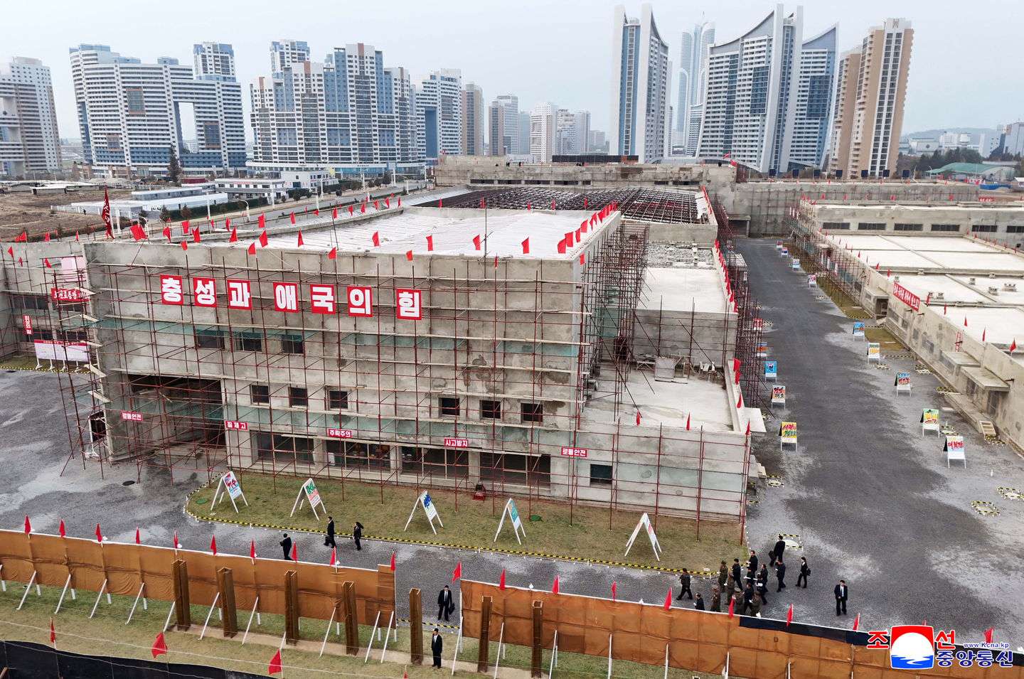 North Korean leader Kim Jong-un inspects the construction sites of a school supply factory and an educational equipment facility in Pyongyang on Nov. 4, in a photo run by the Korean Central News Agency the next day. [KCNA]