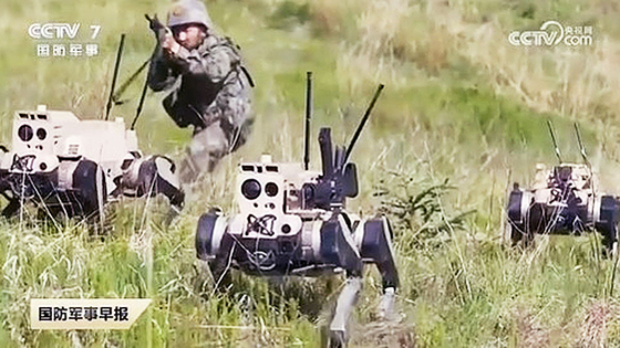 Chinese state broadcaster China Central Television broadcast Chinese People’s Liberation Army conducting a drill using four-legged “wolf robots.”  [CCTV] 