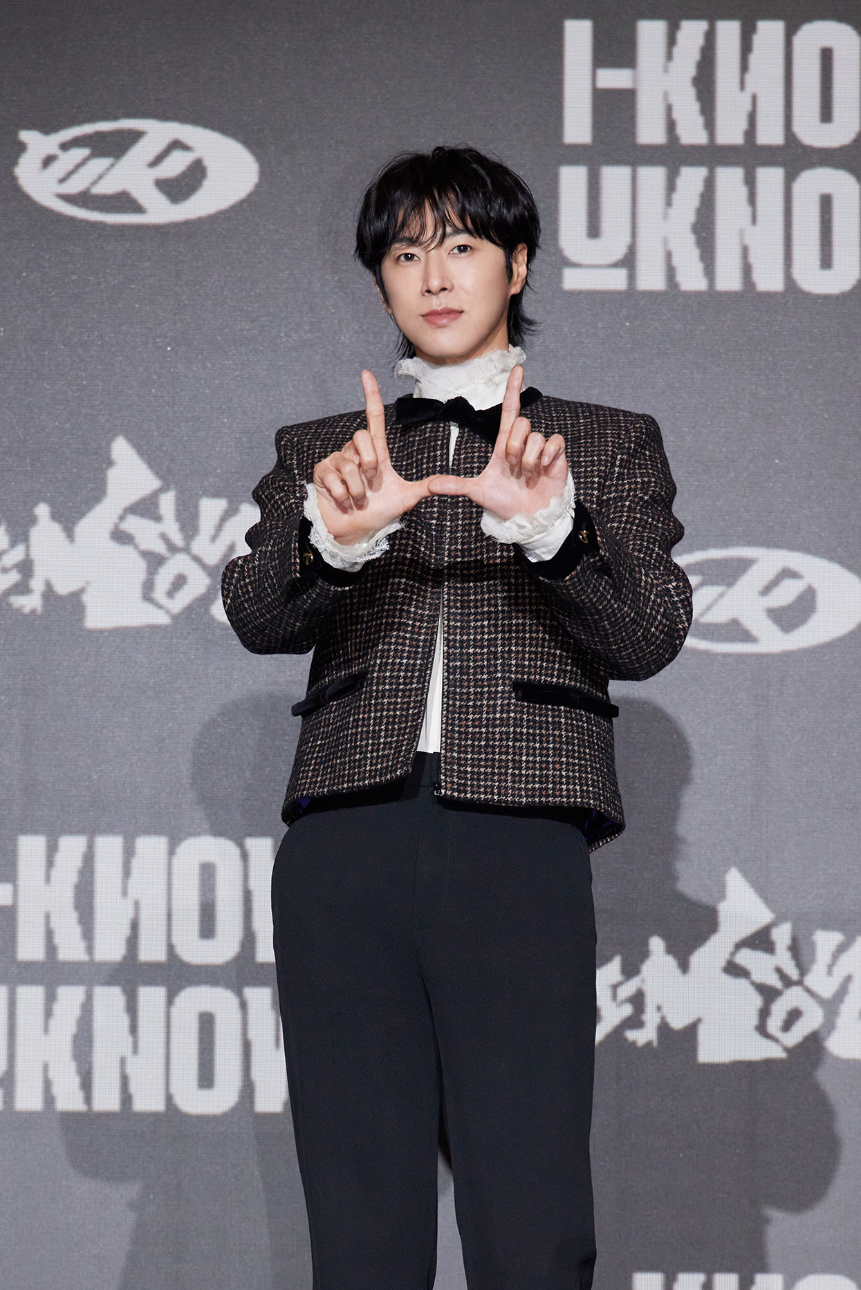 TVXQ's U-Know Yunho poses for photos during a press conference for his first full-length solo album, ″I-Know,″ in southern Seoul on Nov. 5. [SM ENTERTAINMENT]