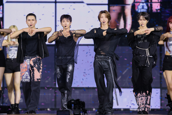 Boy band Seventeen performs during its latest concert “NEW_,” which kicked off at Incheon Asiad Main Stadium in Incheon with two shows on Sept. 13 and 14. [PLEDIS ENTERTAINMENT]
