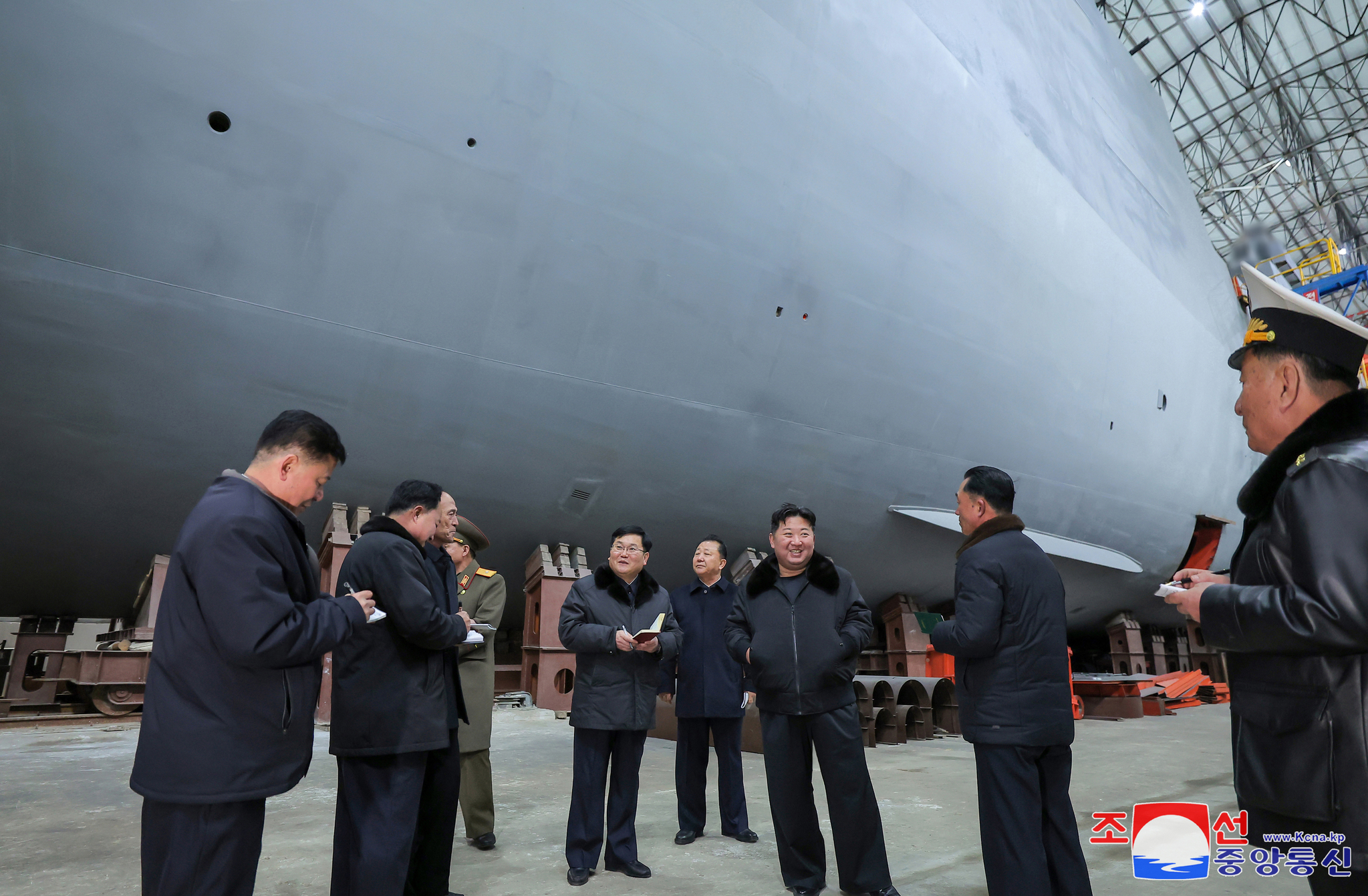 North Korean leader Kim Jong-un inspects the construction of a nuclear-powered submarine, the Korean Central News Agency reported on March 8. [KOREAN CENTRAL NEWS AGENCY/YONHAP]