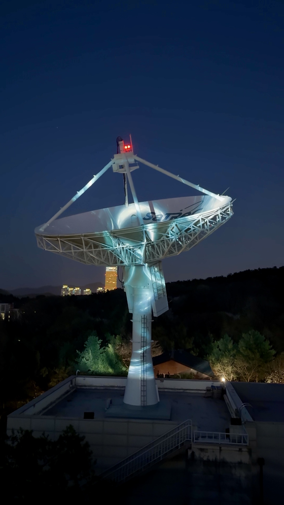 Media artwork ″Iris″ is projected on to an antenna used by KAIST's next-generation small satellite to send G-Dragon's song ″Home Sweet Home″ (2024) to space on April 9. [KAIST]