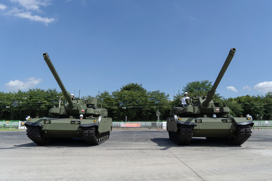 Hyundai Rotem's K2 tanks, bound for Poland, are positioned at the company's Changwon plant in Changwon, South Gyeongsang. [HYUNDAI ROTEM]