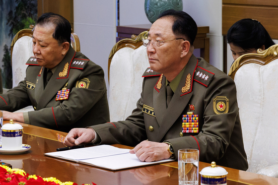 North Korea's Defence Minister, General No Kwang-chol, right, holds bilateral talks with Russia's Defense Minister Andrei Belousov on Nov. 29, 2024. [RUSSIAN MINISTRY PRESS OFFICE] 