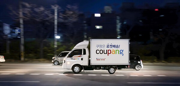 A Coupang delivery truck makes deliveries. [COUPANG] 