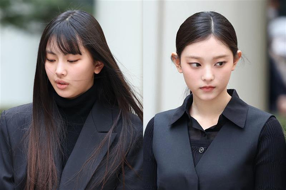Members Hyein, left, and Haerin, of girl group NewJeans [YONHAP]