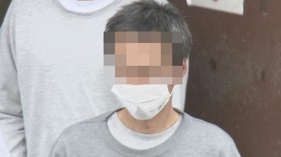 Japanese police arrested a Korean man, surnamed Choi, on charges of assaulting a middle school student in Tokyo, Japan, pictured in this screen capture from local broadcaster TBS Television. [SCREEN CAPTURE] 
