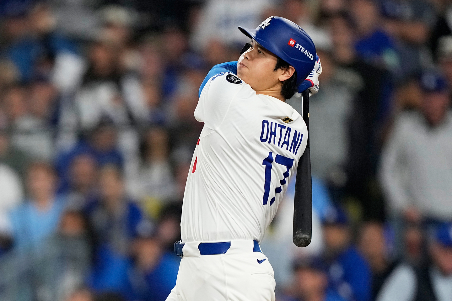 Los Angeles Dodgers' Shohei Ohtani watches his home run against the Toronto Blue Jays during the seventh inning in Game 3 of the World Series in Los Angeles on Oct. 27. [AP/YONHAP]