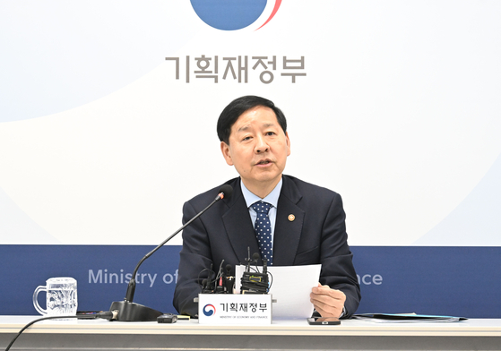  Finance Minister Koo Yun-cheol speaks during a press conference held at the government complex in Sejong on Wednesday. [MINISTRY OF ECONOMY AND FINANCE]
