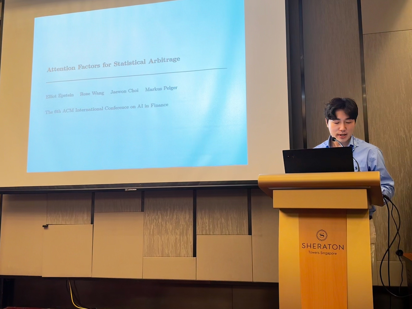 A representative of Hanwha Life’s AI research center presents on research at Icaif 2025, held from Nov. 15 to 18. [HANWHA LIFE]
