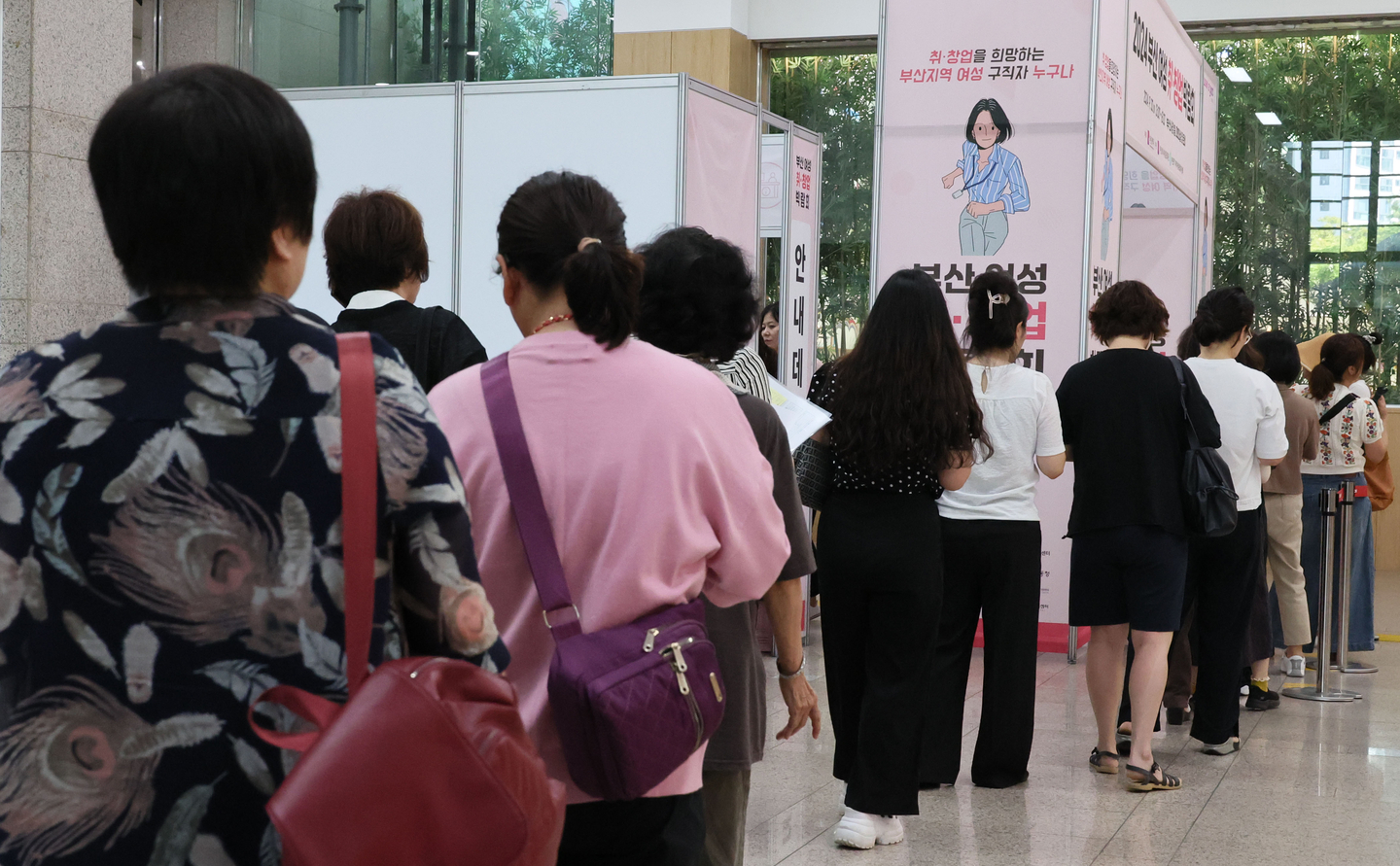 Visitors are seen at a job fair for women hosted by the Busan city government and the Busan Women's Culture Center, where special programs women who have had to leave the workforce due to marriage or parenting were provided, at Busan City Hall on Sept. 30, 2024. [SONG BONG-GEUN]