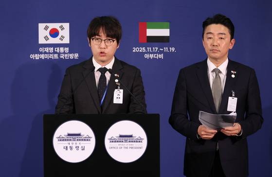 Ha Jung-woo, left, presidential secretary of AI policy and future planning, explains the results of President Lee Jae Myung's summit with UAE President Mohamed bin Zayed Al Nahyan in a press briefing in Abu Dhabi on Nov. 18. [YONHAP] 