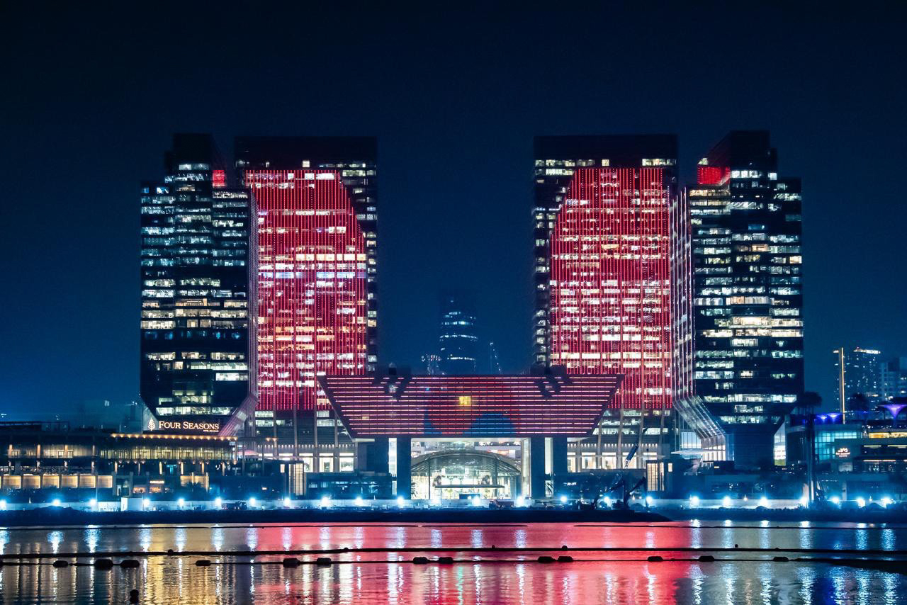 The Taegeukgi, South Korea’s national flag, illuminates the Abu Dhabi Global Market building in the United Arab Emirates during President Lee Jae-myung's state visit on Nov. 17. [PRESIDENTIAL OFFICE]