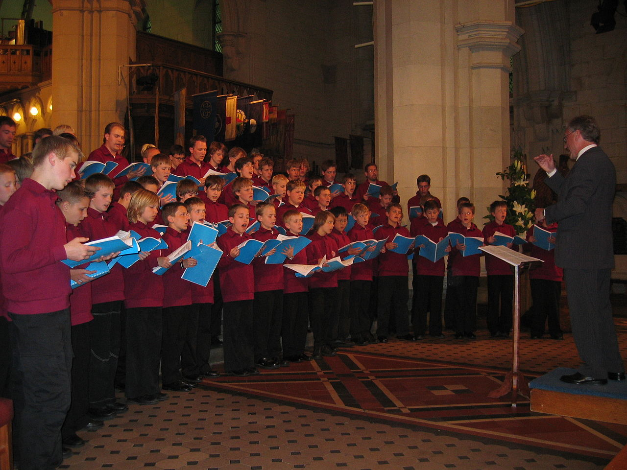 A boys’ choir performs without accompaniment at Roskilde Domkirke in Denmark. The a cappella form, rooted in sacred medieval music, has since expanded across genres and inspired a wide range of modern vocal ensembles. [WIKIPEDIA] 