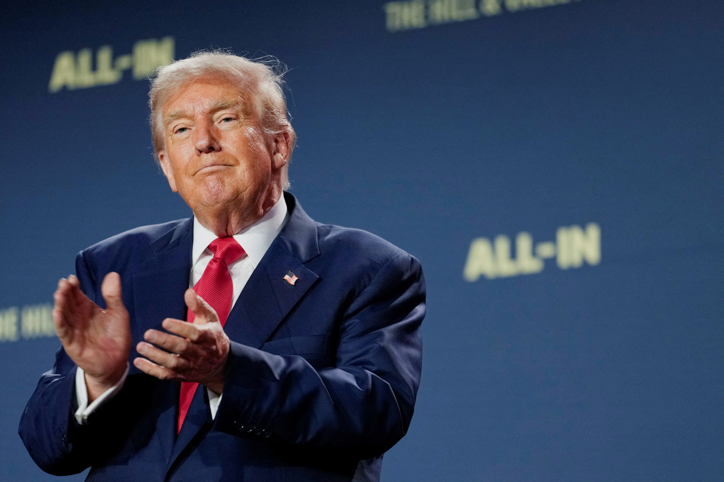 U.S. President Donald Trump applauds at the ″Winning the AI Race″ summit in Washington on July 23. [REUTERS/YONHAP]