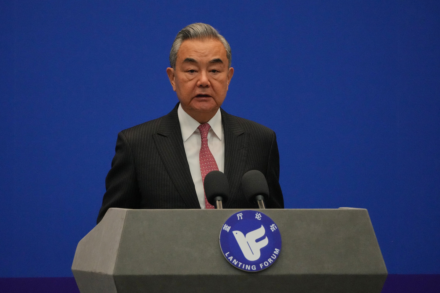 Chinese Foreign Minister Wang Yi delivers his opening remarks at the Lanting Forum on Improving Global Governance to Build a Community with a Shared Future for Humanity, at the Ministry of Foreign Affairs office, in Beijing, Oct. 27. [AP/YONHAP]