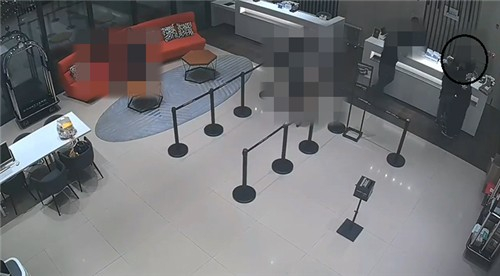 CCTV footage shows a former teacher and her high school student kissing and hugging at a hotel lobby. [YONHAP]
