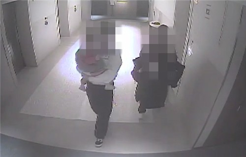 CCTV footage shows a former teacher and her high school student together, along with the teacher's young son. [YONHAP]