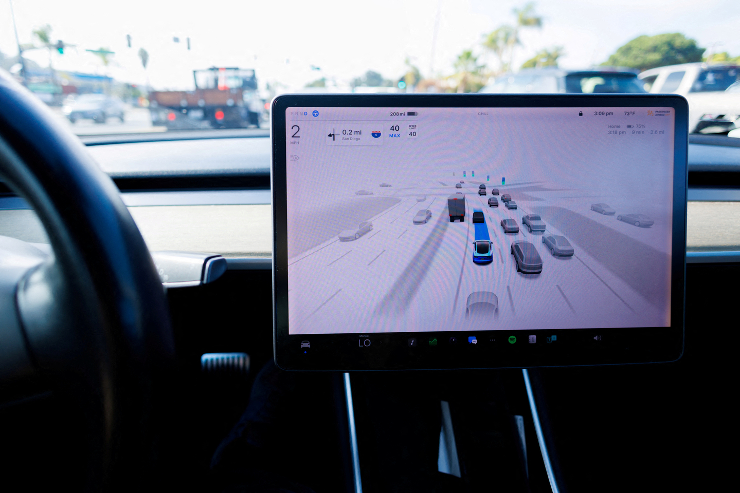 A Tesla Model 3 vehicle drives using Full Self-Driving in Encinitas, California, on Oct. 18, 2023. [REUTERS/YONHAP] 
