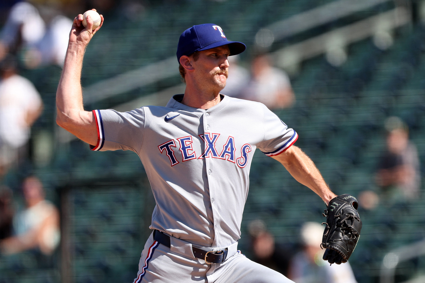 Texas Rangers pitcher Caleb Boushley throws a pitch against the Athletics during the eighth inning at Sutter Health Park in California on Aug. 31. [REUTERS/YONHAP]