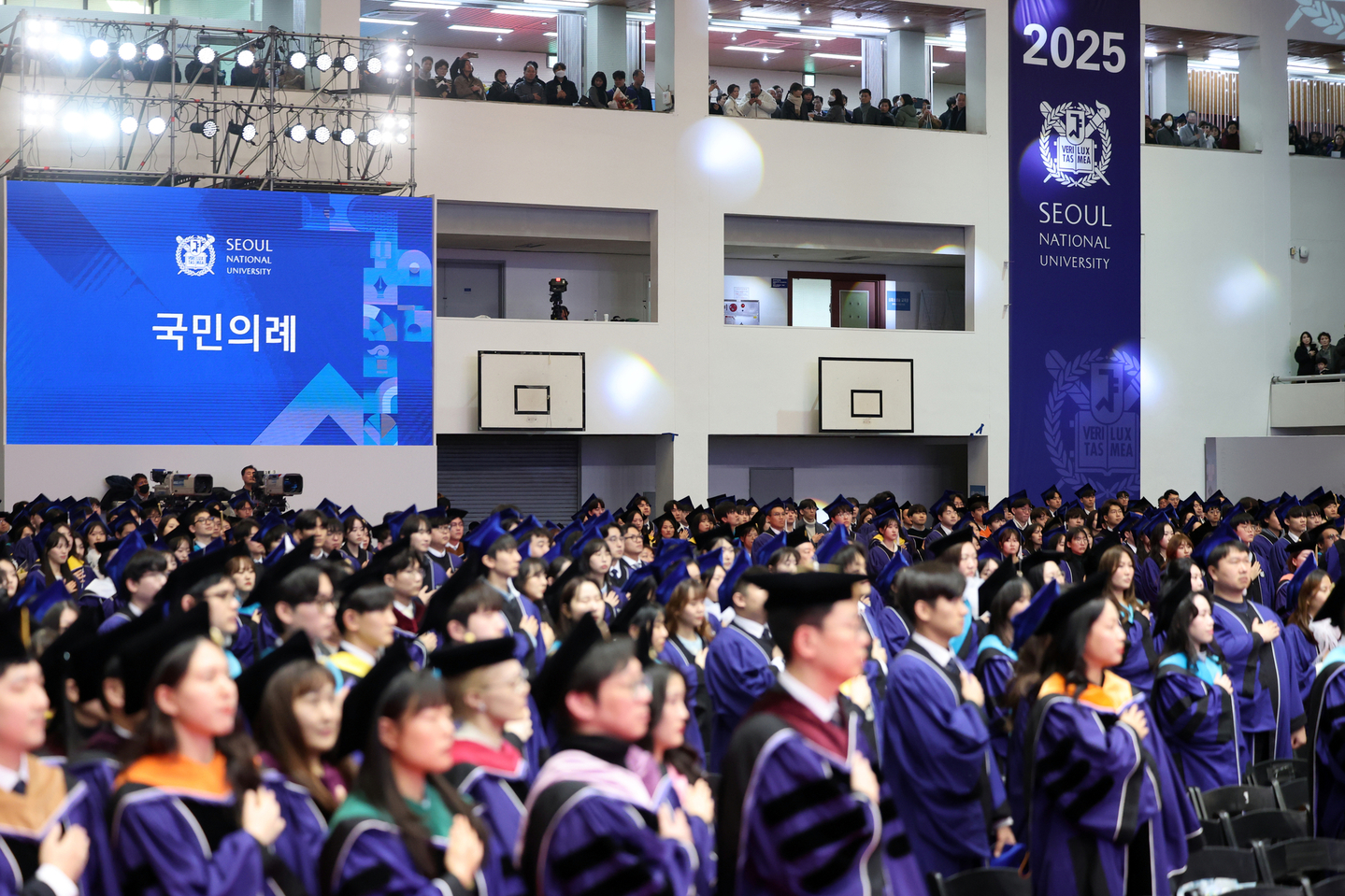Seoul National University graduates attend their graduation ceremony at the university campus in Gwanak District, southern Seoul, on Feb. 26. [NEWS1]