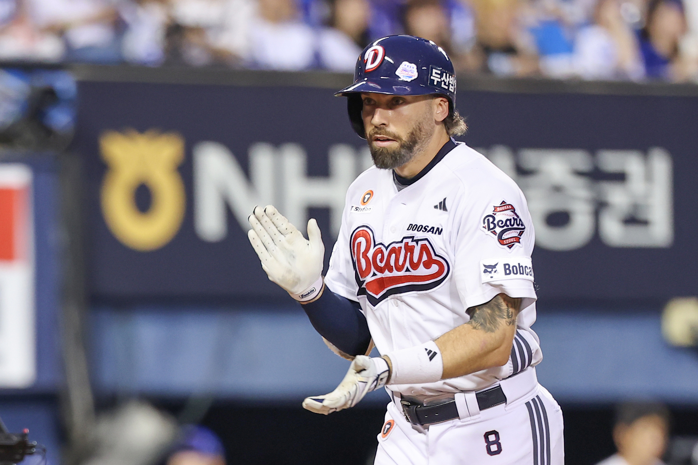 Jake Cave of the Doosan Bears celebrates after hitting a two-run home run against the Samsung Lions during the clubs' KBO regular-season game at Jamsil Baseball Stadium in southern Seoul on Aug. 28. [YONHAP]
