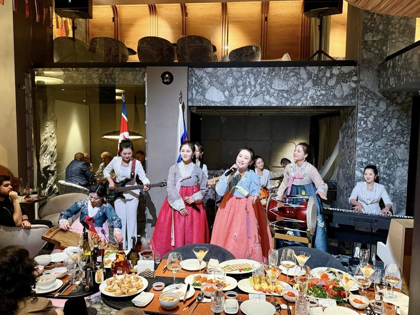 Women wearing hanbok (traditional Korean dress) perform at a newly opened North Korean restaurant in Moscow, Russia, in this photo uploaded on Facebook by the Russian Embassy to North Korea on Nov. 28. The restaurant reportedly opened on Nov. 26. [RUSSIAN EMBASSY]