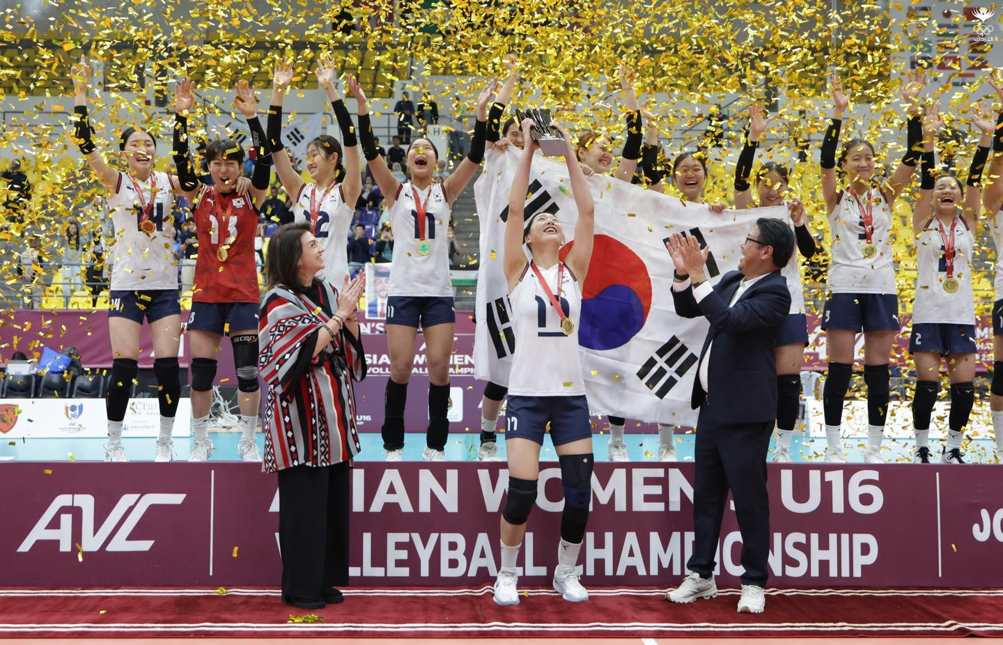 The Korean women's volleyball team celebrates winning the 2025 Asian Women's U-16 Volleyball Championship in Jordan on Nov. 8. [YONHAP]