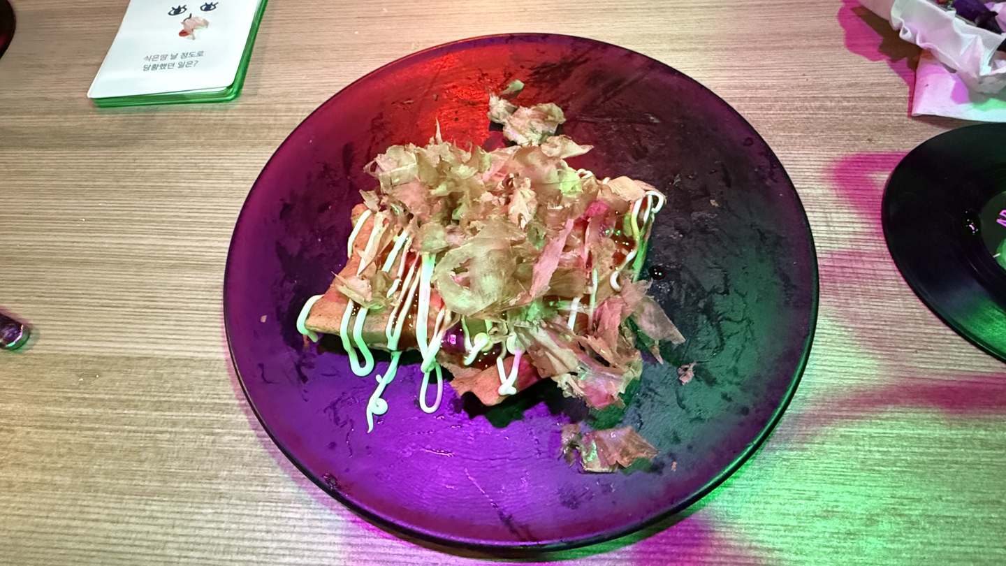 a takoyaki (baked Japanese snack) bungeoppang (fish-shaped pastry) [WOO JI-WON]