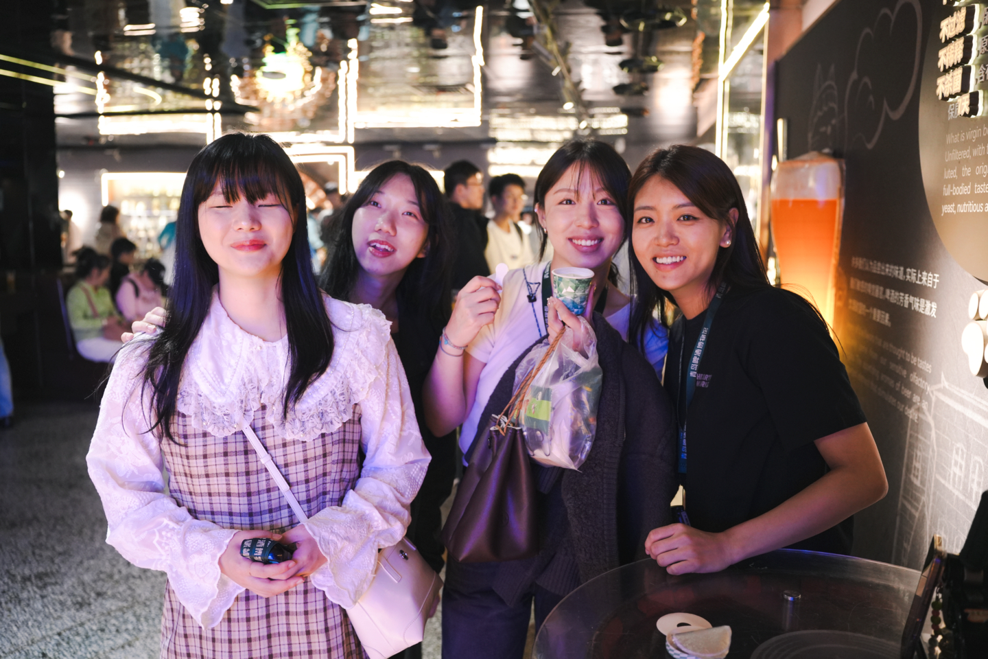 Yuhan Sun, second from right, and Heartyworks' CEO Kim Hyeon-jin, right, pose for a photo with other staff. [HEARTYWORKS]