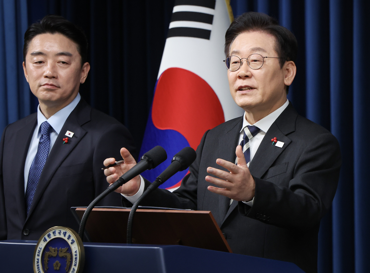 President Lee Jae Myung, center, takes questions from reporters after an address at the presidential office in Yongsan District, central Seoul, on Dec. 3, marking the first anniversary of former President Yoon Suk Yeol's declaration of martial law. [JOINT PRESS CORPS] 