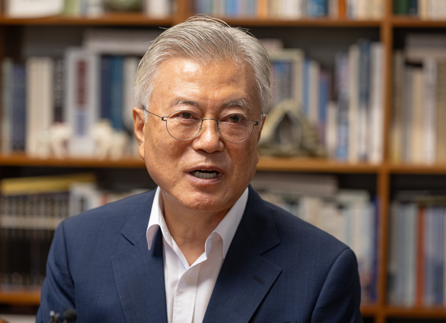 Former President Moon Jae-in speaks during his meeting with Rep. Jung Chung-rae, leader of the ruling Democratic Party, in Yangsan, South Gyeongsang, on Aug. 7. [YONHAP]
