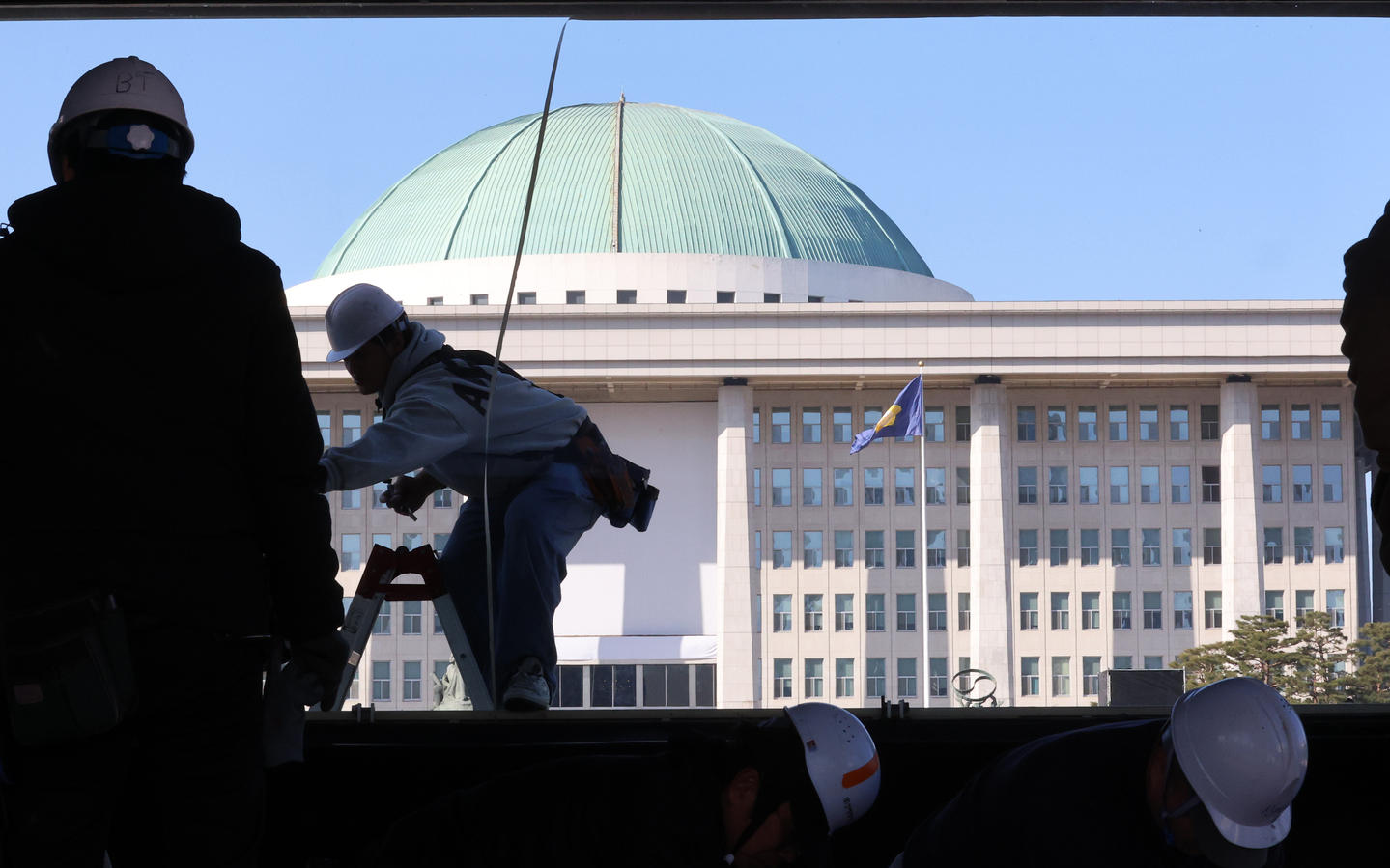 Broadcast booths from major networks are being set up at the National Assembly in Yeouido, western Seoul, on Dec. 1, ahead of the first anniversary of the Dec. 3 martial law crisis. [YONHAP]