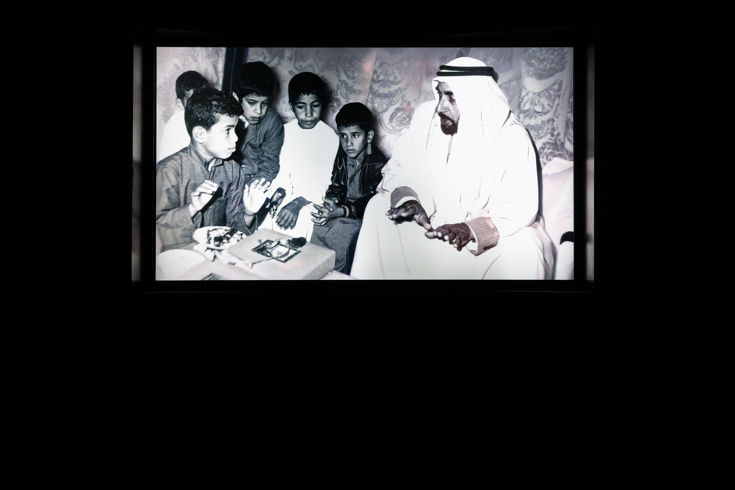 A photo of Sheikh Zayed bin Sultan Al Nahyan, the founding father of the United Arab Emirates, displayed inside the "Our Beginning" gallery at the Zayed National Museum [ZAYED NATIONAL MUSEUM] 