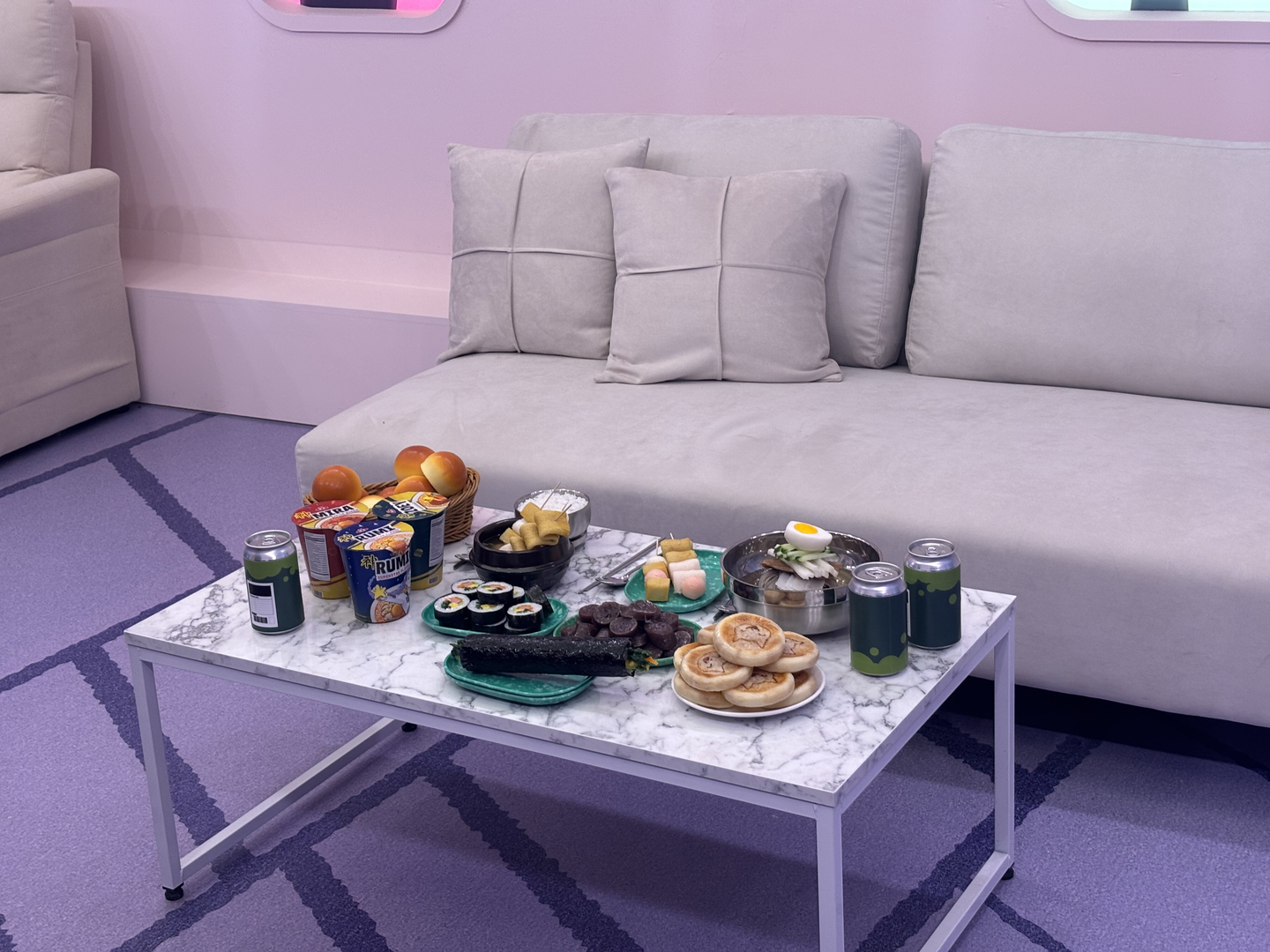 Korean dishes are displayed inside HUNTR/X private jet zone at Netflix's ″KPop Demon Hunters″ pop up store in Seongsu-dong, eastern Seoul. [KIM MYEONG-JI]