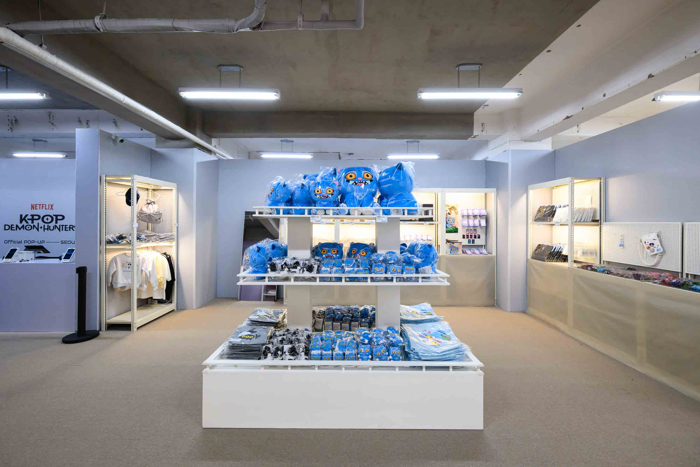 The merchandise area at Netflix's ″Kpop Demon Hunters″ pop-up store in Seongsu-dong, eastern Seoul. [NETFLIX/B.STAGE]
