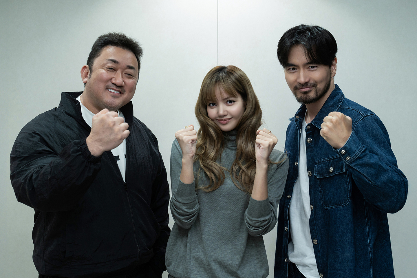 Cast of the upcoming Netflix action film ″TYGO,″ from left, Don Lee, Lisa of Blackpink and Lee Jin-uk [NETFLIX]