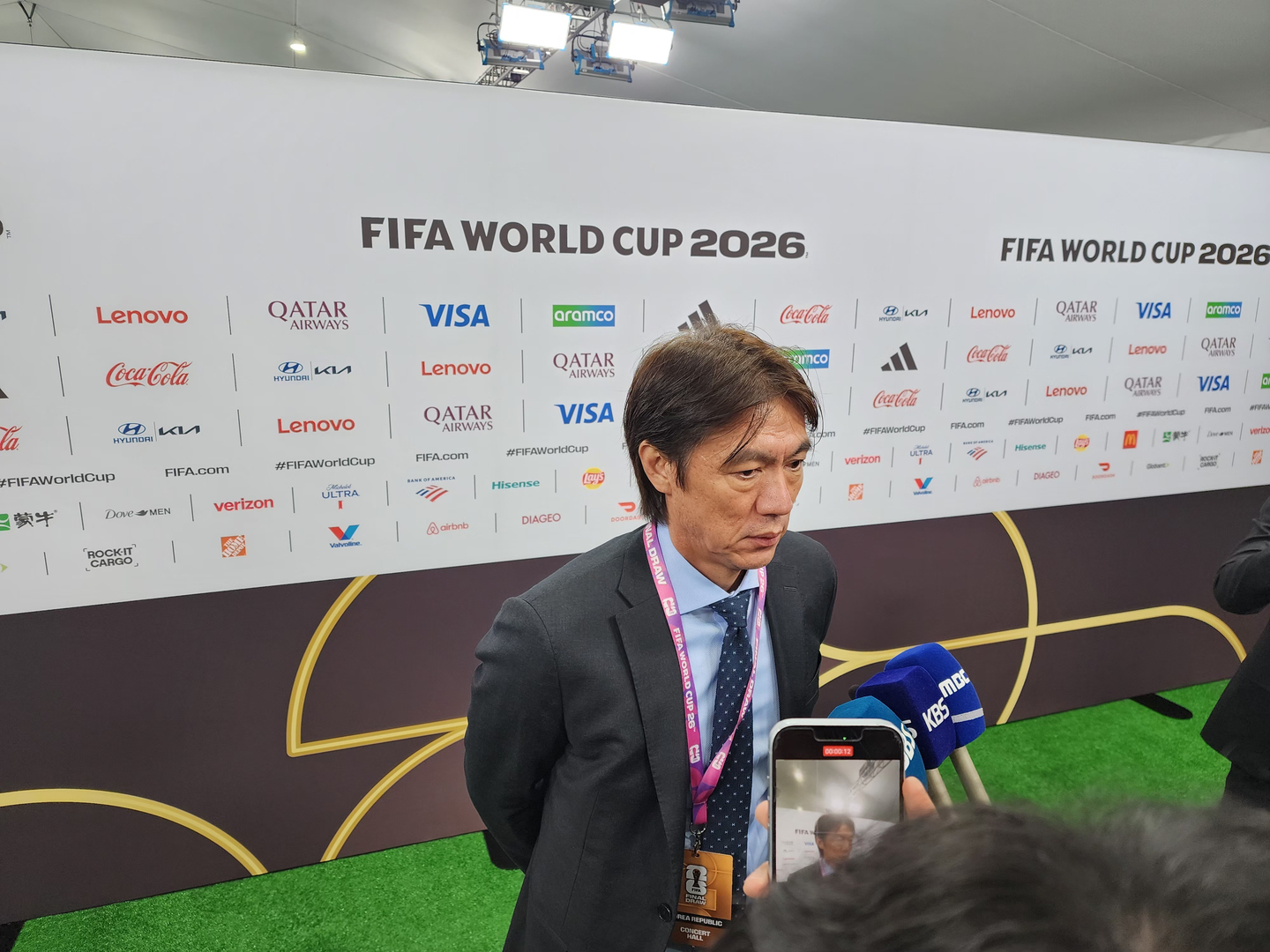 National team coach Hong Myung-bo speaks with reporters following the draw for the 2026 FIFA World Cup at the Kennedy Center in Washington on Dec. 5. [YONHAP]