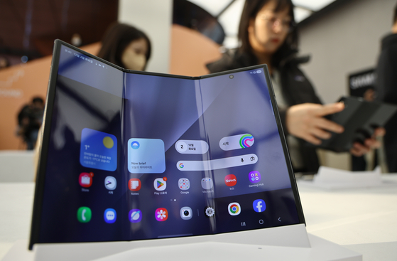 The Galaxy Z TriFold, Samsung Electronics's latest foldable phone, is displayed at a media event in southern Seoul on Dec. 2. [YONHAP]