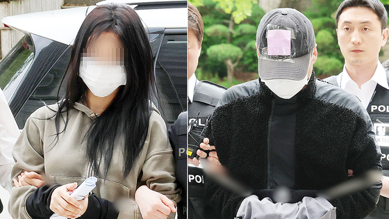 A woman surnamed Yang facing blackmail charges for trying to extort money from Son Heung-min, left, and a man surnamed Yong appear for a pretrial detention hearing at the Seoul Central District Court in southern Seoul on May 17. [NEWS1]