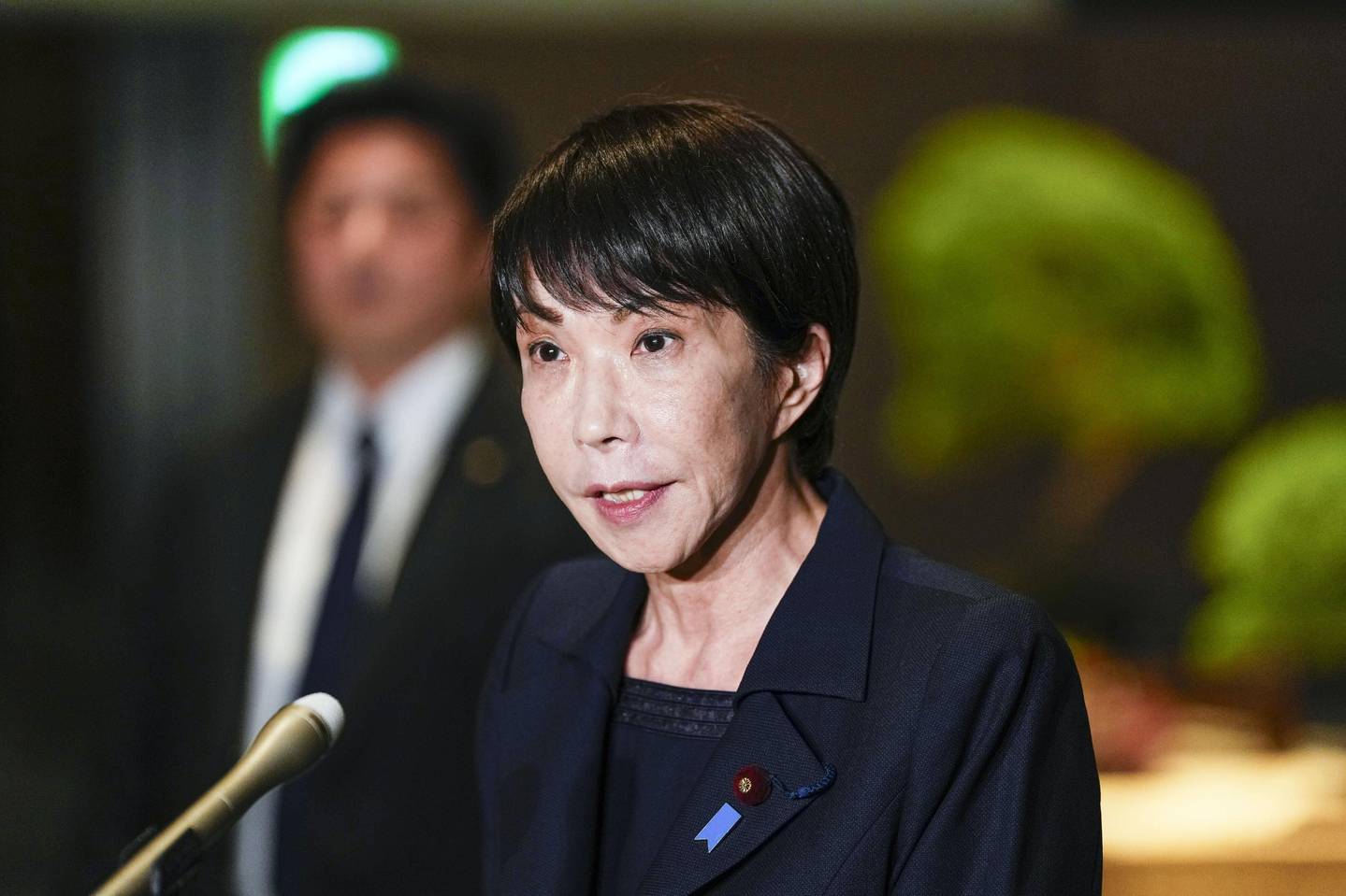 Japan's Prime Minister Sanae Takaichi speaks to reporters at the prime minister's office in Tokyo after a strong earthquake struck northeastern Japan, in this photo taken by Kyodo News. [AP/YONHAP]