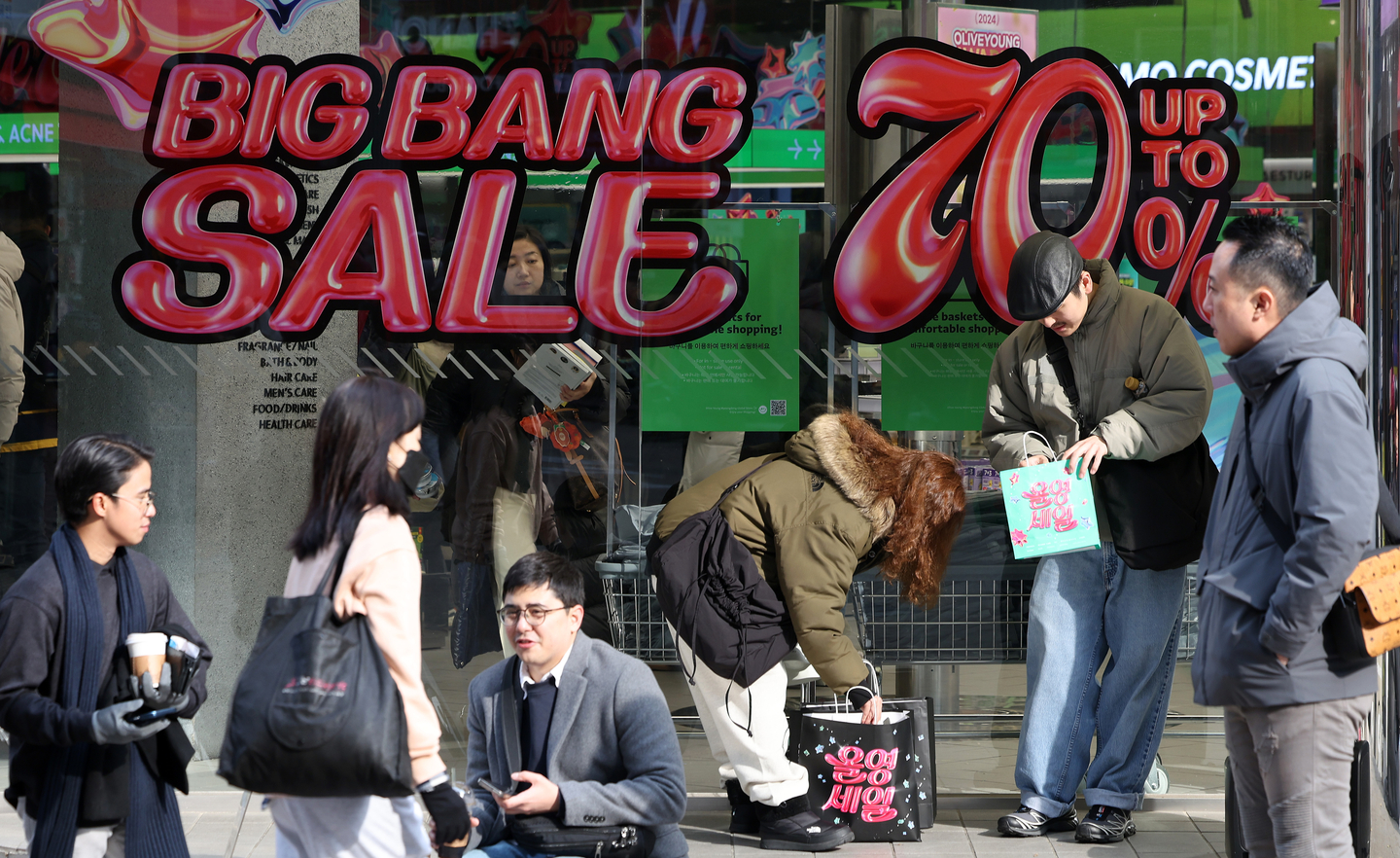 Tourists and shoppers are seen in front of Olive Young's Myeondong store in Jung District, central Seoul, on Dec. 1, 2024. [NEWS1] 
