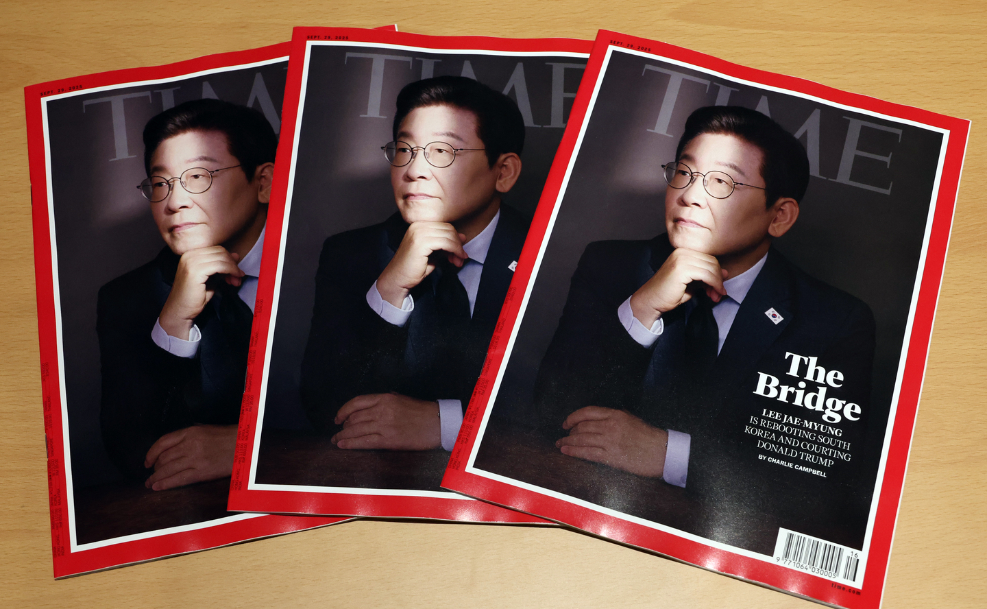 Print editions of TIME magazine with an interview with President Lee Jae Myung on the cover are seen in this photo provided by the presidential office on Sept. 18. [PRESIDENTIAL OFFICE] 