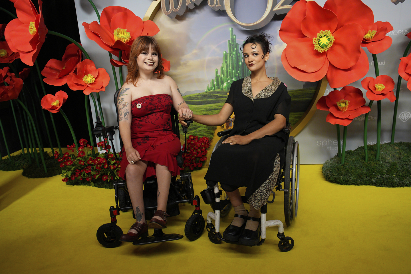 Marissa Bode, right poses with partner Lauren Brooks during arrivals at the premiere of "The Wizard of Oz" at Sphere on Aug. in Las Vegas. [AP/YONHAP]