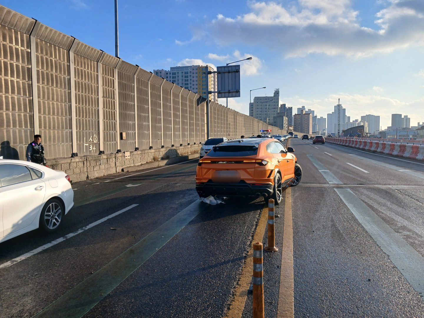 A damaged Lamborghini lies on Incheon-daero near the Dohwa Interchange in Dohwa-dong, Michuhol District, Incheon, on Dec. 14. [INCHEON FIRE SERVICES]