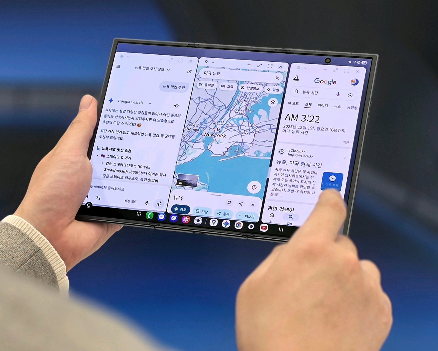 A customer holds a Samsung Galaxy Z TriFold smartphone [SAMSUNG ELECTRONICS]