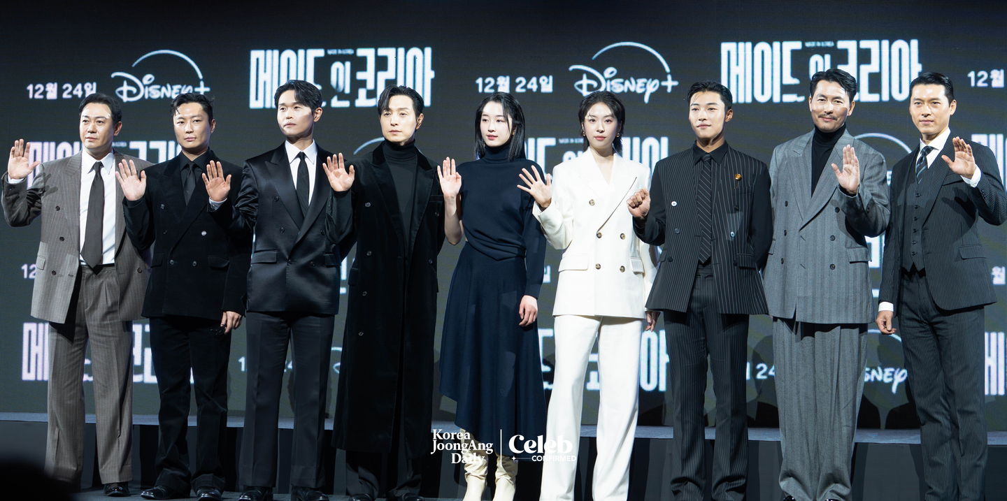 The cast of the Disney+ series “Made in Korea” poses for photos during a press conference at the Grand InterContinental Seoul Parnas in southern Seoul on Dec. 15. [DANIELA GONZALEZ PEREZ]
