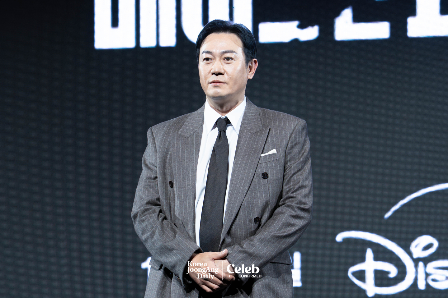 Actor Park Yong-woo poses for photos during a press conference for the Disney+ series “Made in Korea” at the Grand InterContinental Seoul Parnas in southern Seoul on Dec. 15. [DANIELA GONZALEZ PEREZ]