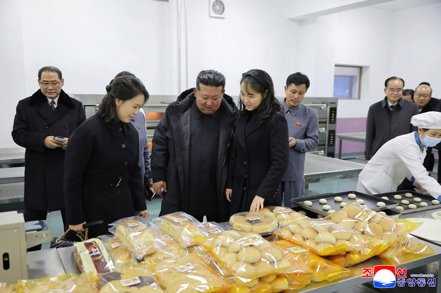 Kim Jong-un, center, tours newly built facilities in Gangdong County, on the outskirts of Pyongyang, with his daughter Kim Ju-ae, at his right, and his wife, Ri Sol-ju, at his left, on Dec. 15. [KOREAN CENTRAL NEWS AGENCY]